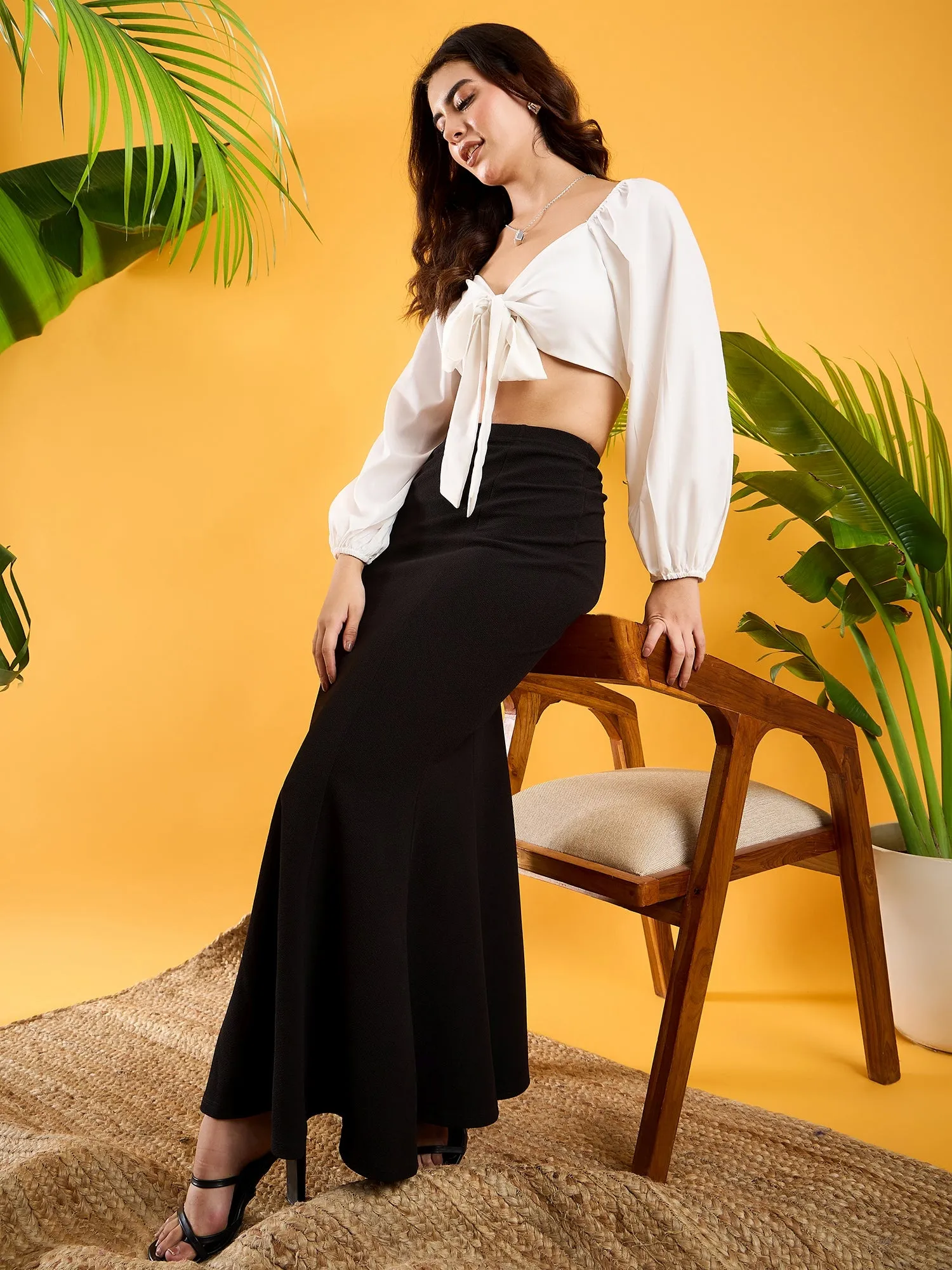 Berrylush Women Solid Black High-Rise Waist Slip-On Flutter Hem Knitted A-Line Maxi Skirt