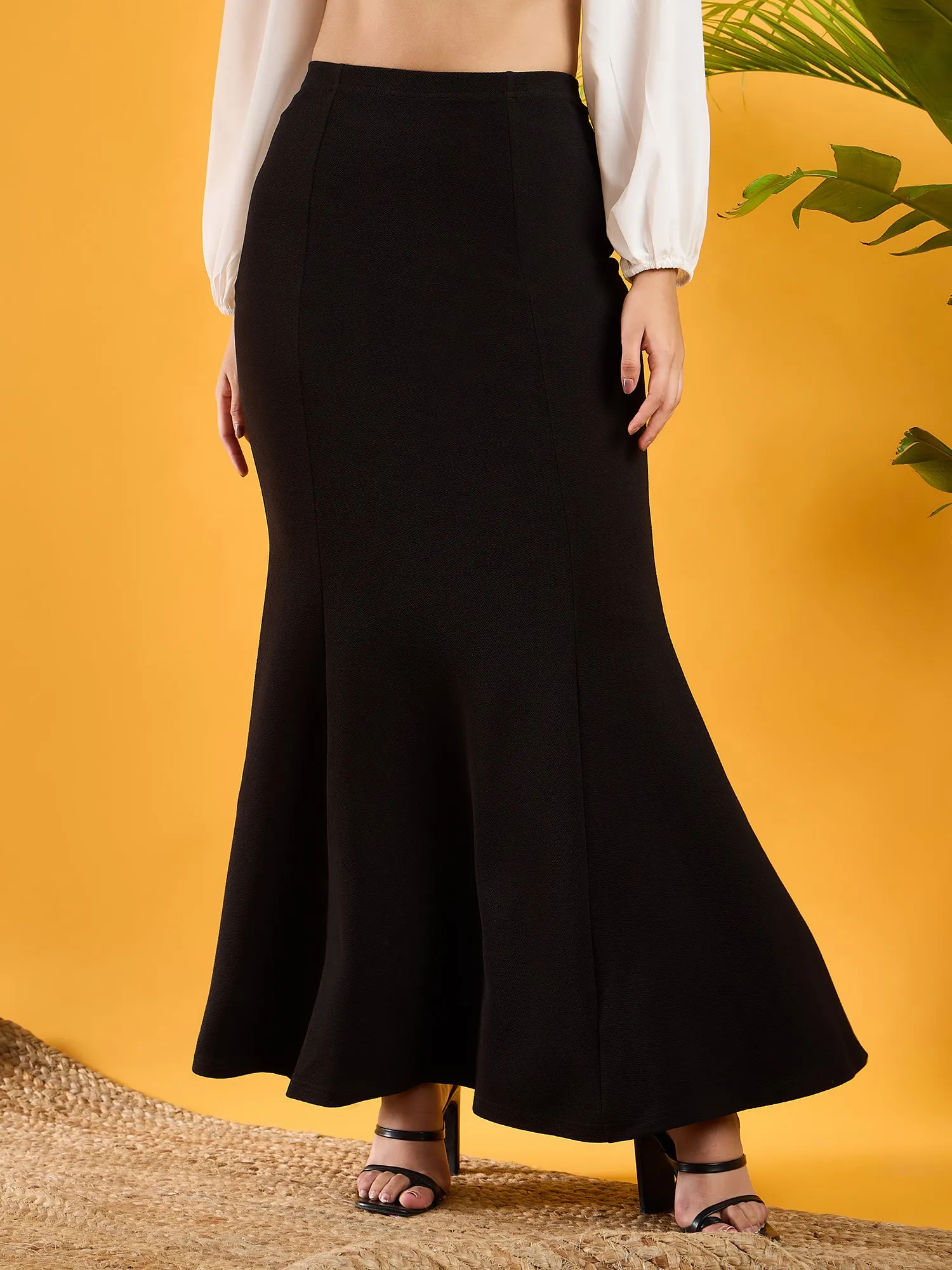 Berrylush Women Solid Black High-Rise Waist Slip-On Flutter Hem Knitted A-Line Maxi Skirt